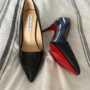 Black heels with red soles